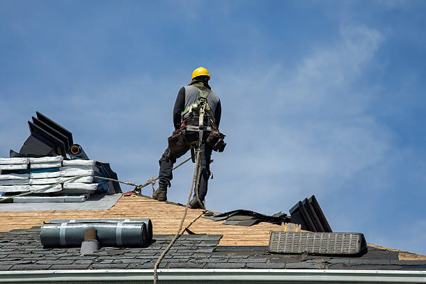 Professional Roof Replacement technician working in Ashland, MA